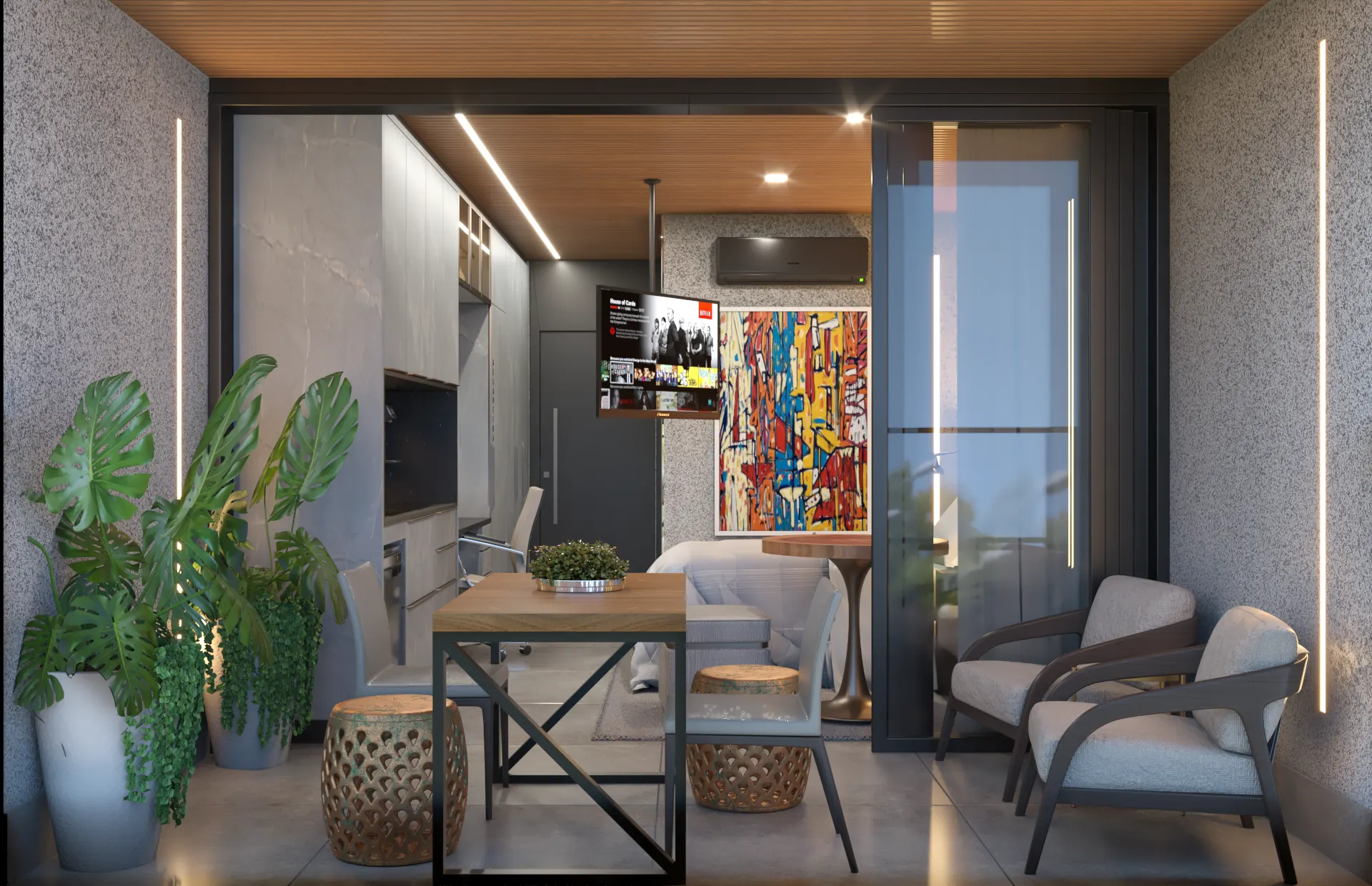 Sacada do studio vista de fora, com poltronas, mesa de apoio e o interior integrado ao fundo.